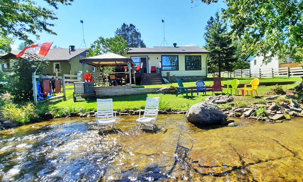  Cottage with river in front