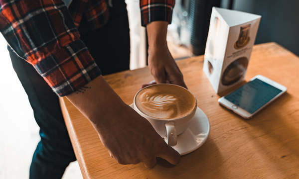 Woman holding coffee mug