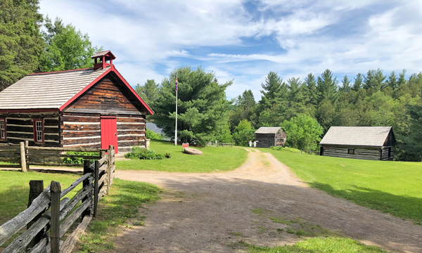 three log buildings