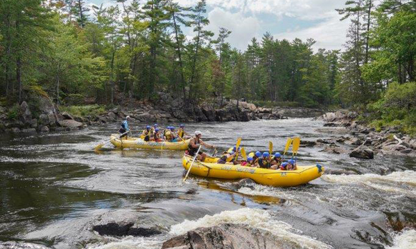 Paddlers on Raft