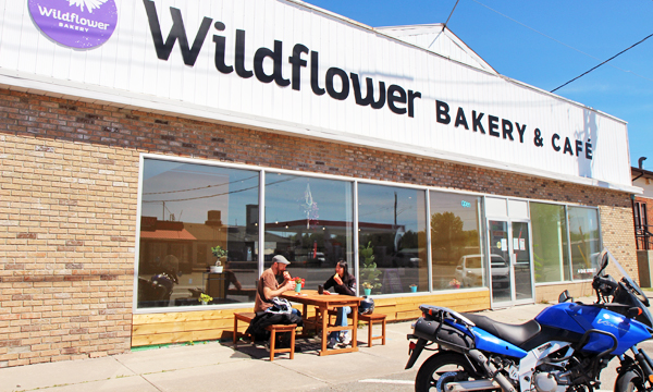 Wildflower bakery storefront with Motorcycle